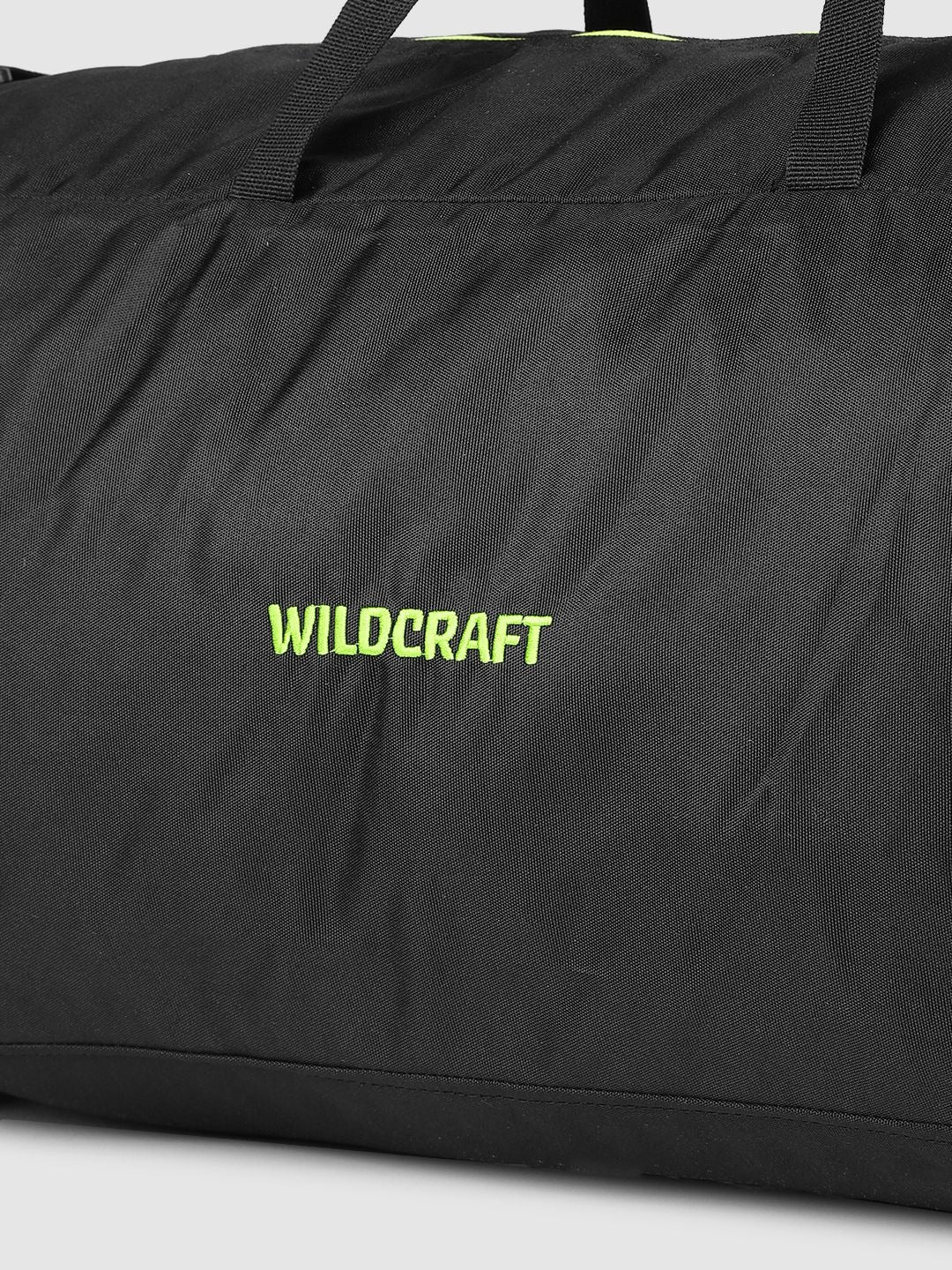 Wildcraft Power Duffle Large Travel Duffel – Solid Black, 1 Main Compartment + 2 Side Pockets